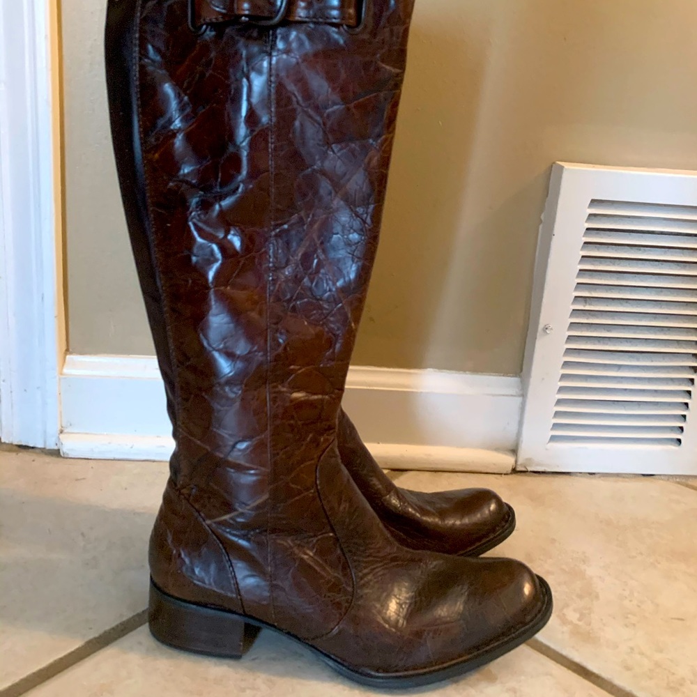 Brown Crown chocolate designer boot. Slightly worn